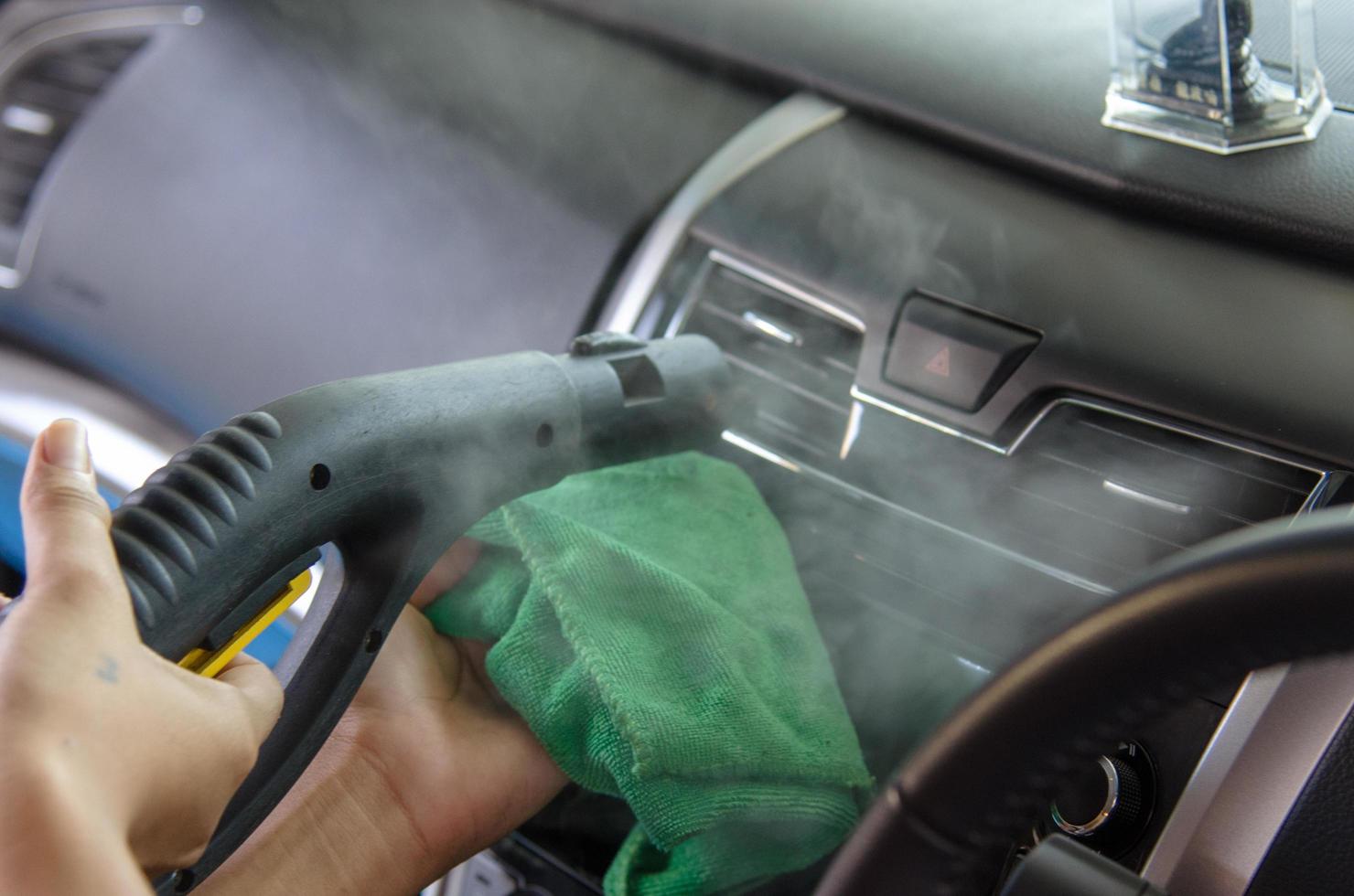 Cleaning the air conditioner of a car photo