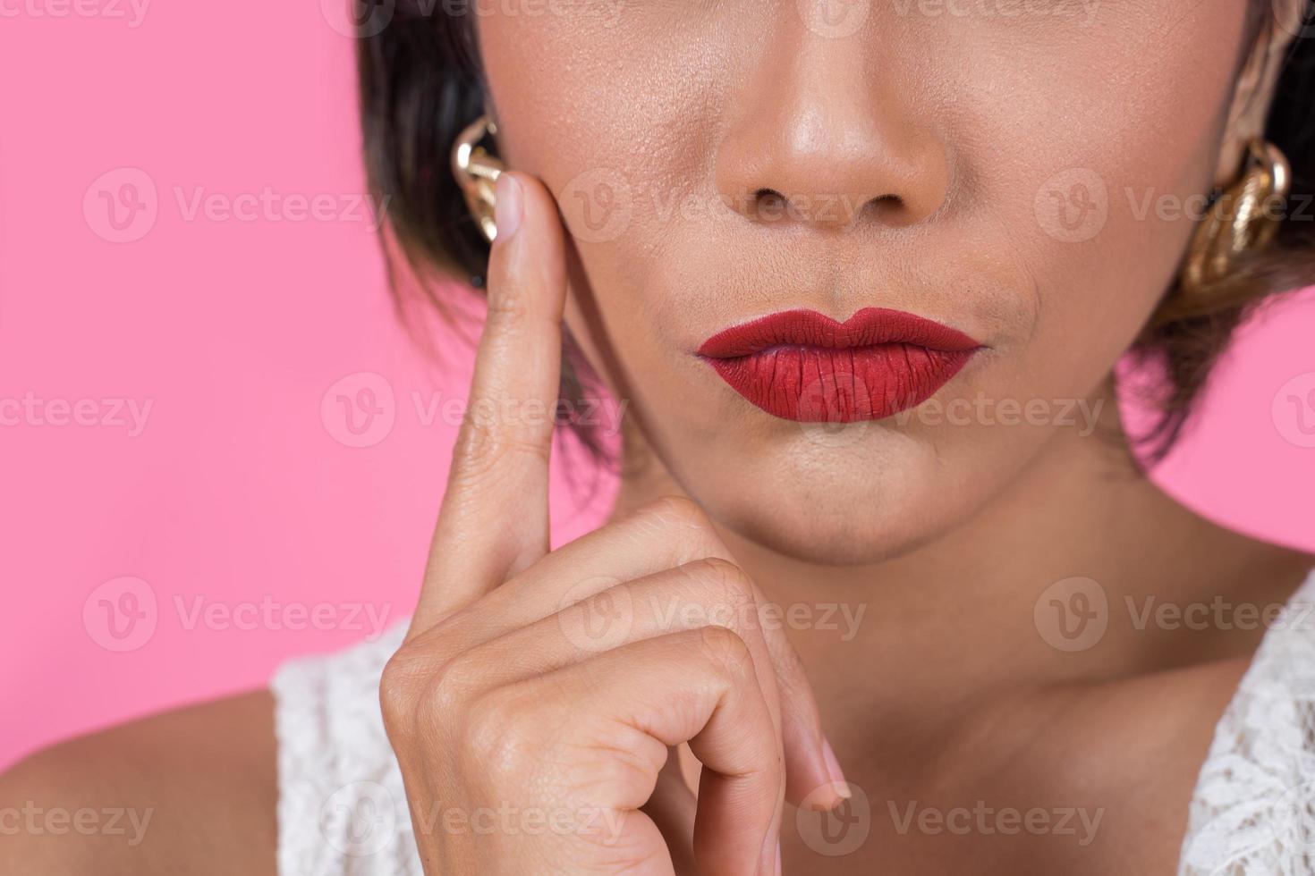 Close-up of fashionable woman with red lips photo