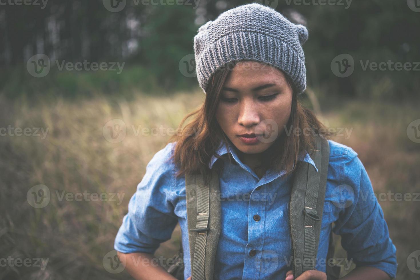 Vintage summer lifestyle fashion portrait of young hipster woman photo