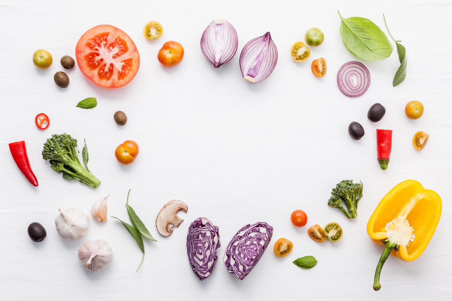 Fresh vegetable and herb frame photo