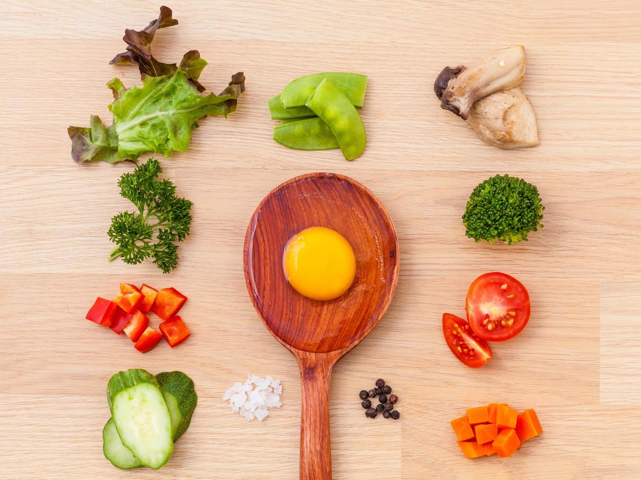Omelet Ingredients on wooden background photo