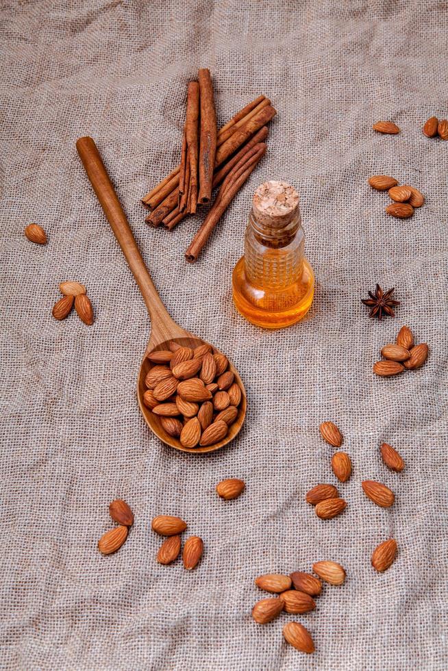 Almonds, oil, and cinnamon photo