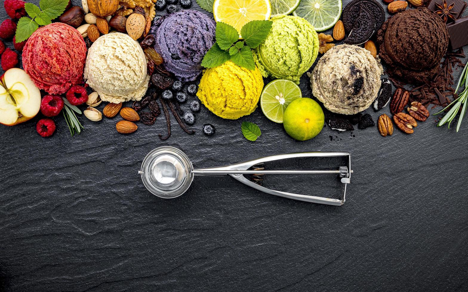 Colorful ice cream with a scoop photo