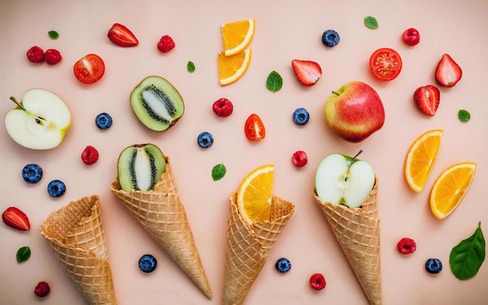 Fresh fruit and ice cream cones photo