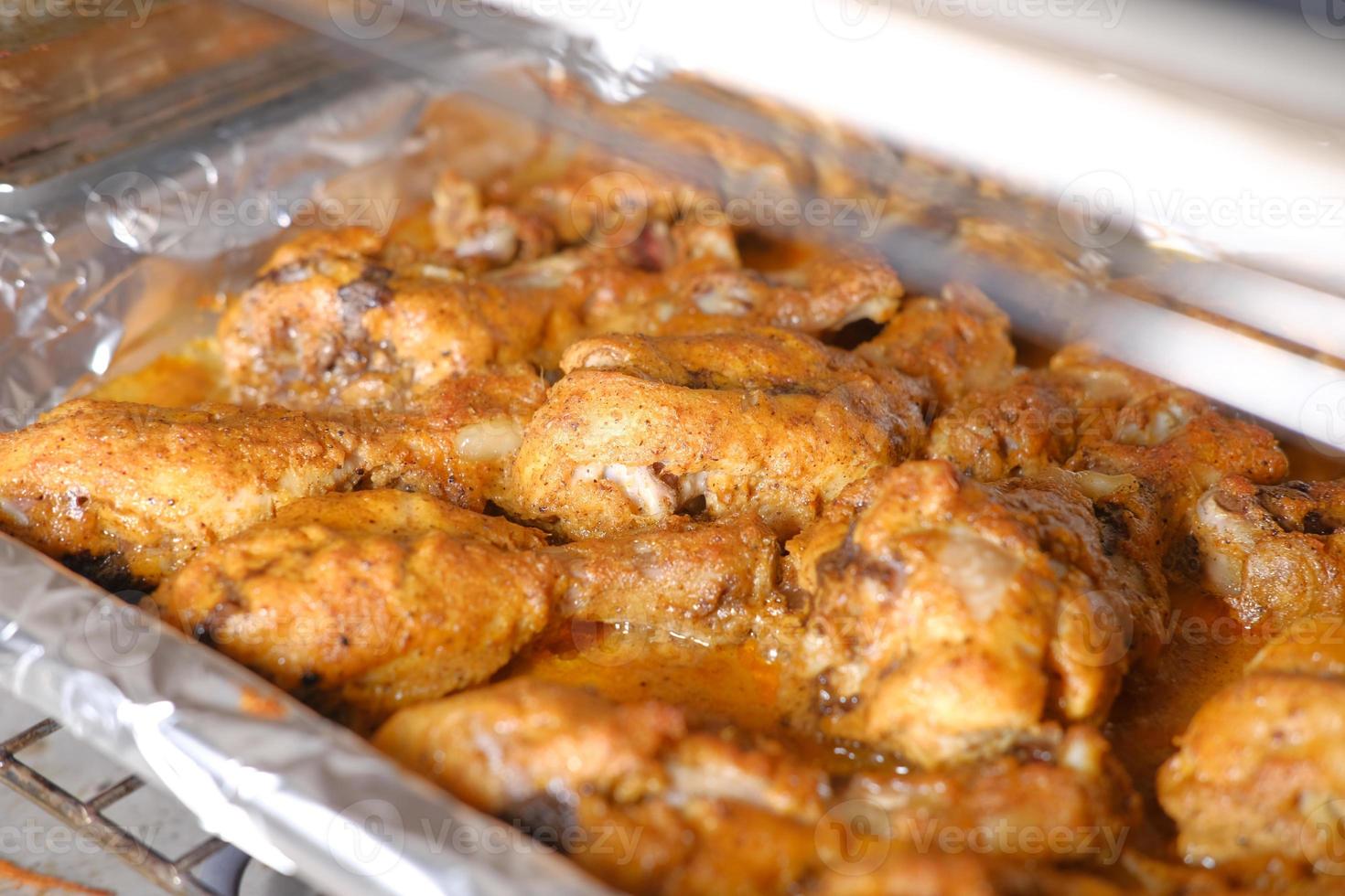 cocinar filetes de pollo a la parrilla en un microondas foto