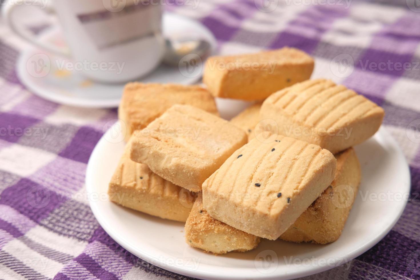 Close-up of cookies and tea on table photo