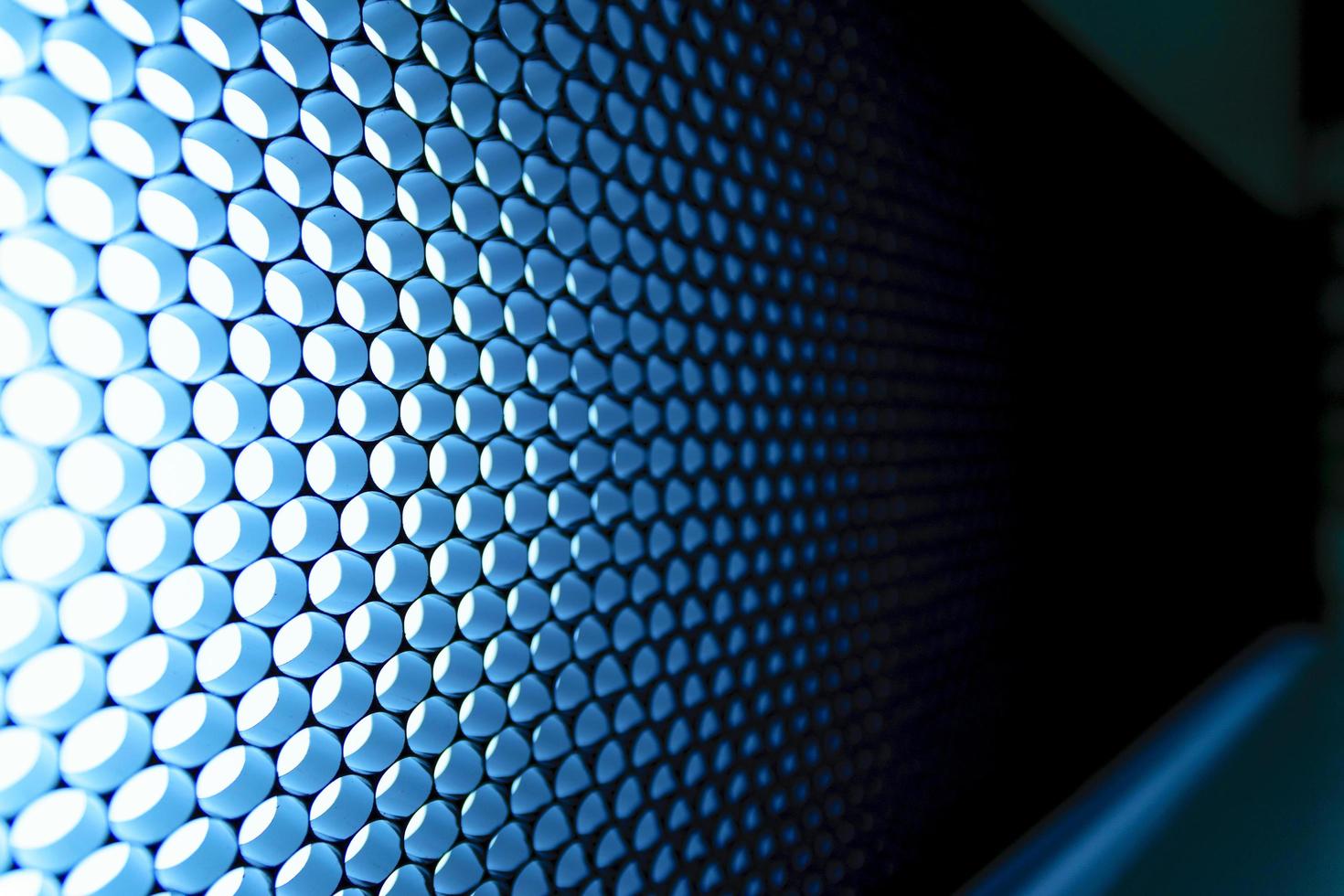 Close-up of panel of blue LED lighting photo