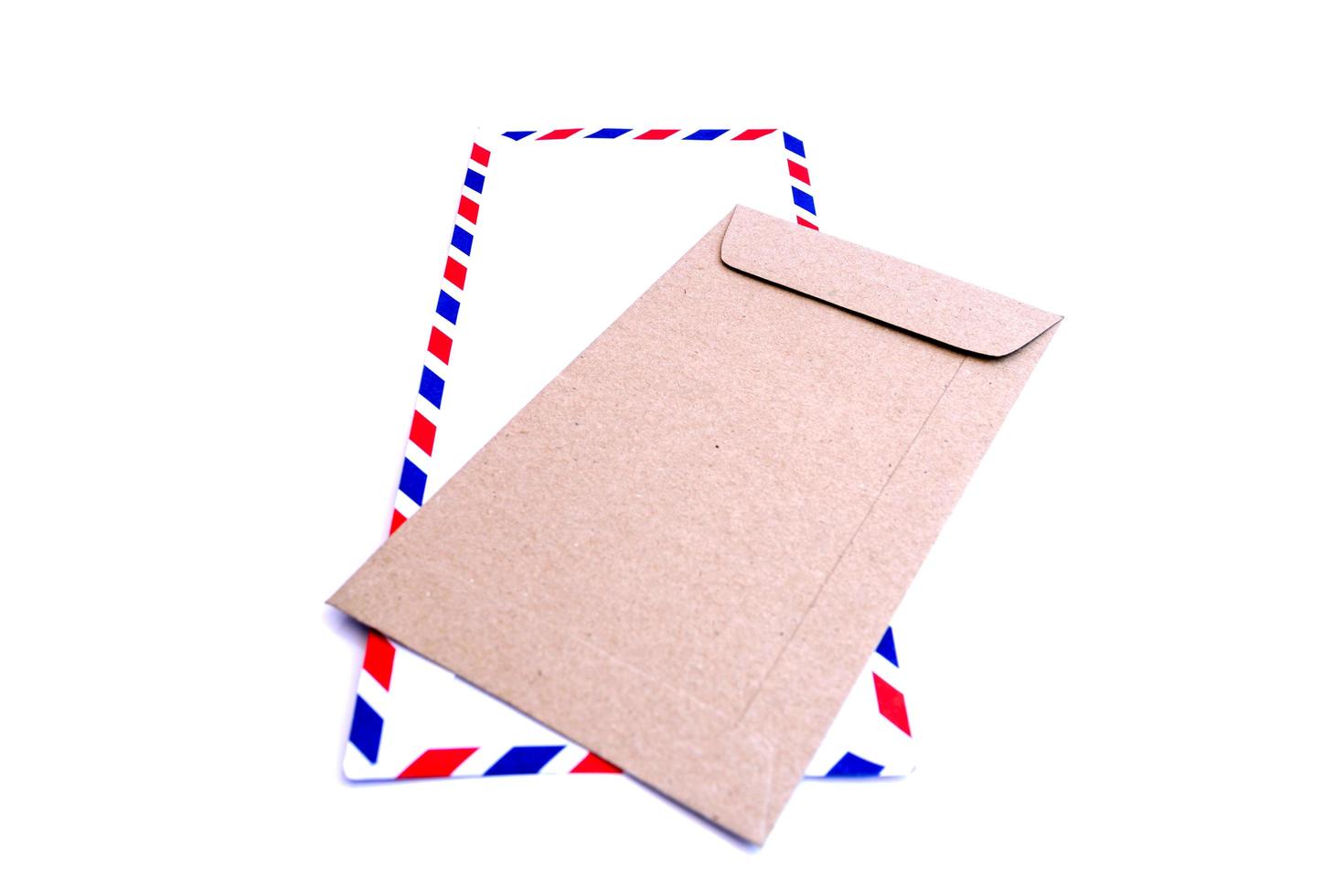 Airmail envelope and pink envelope isolated on white background photo