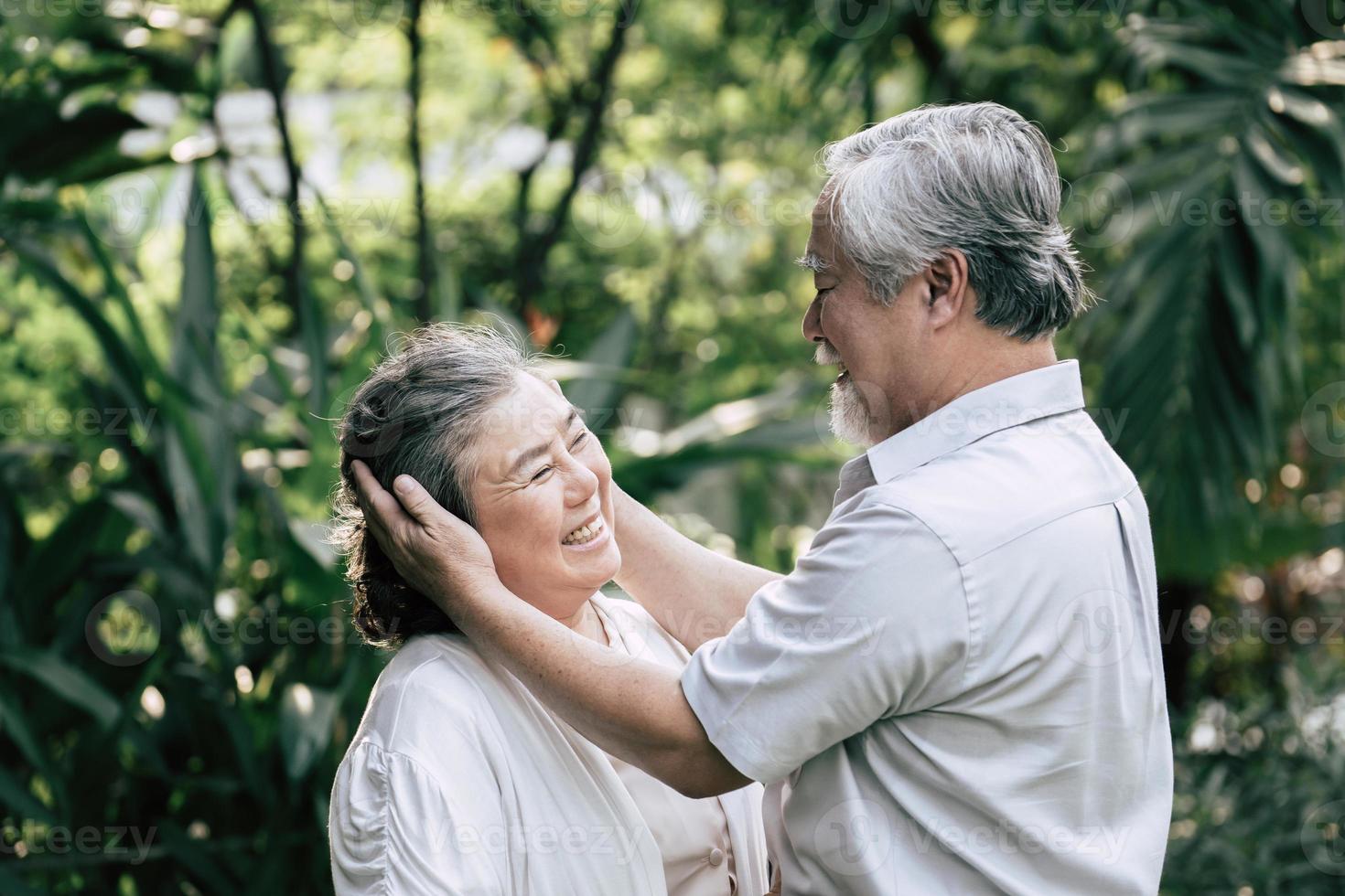 Elderly couple dancing together photo