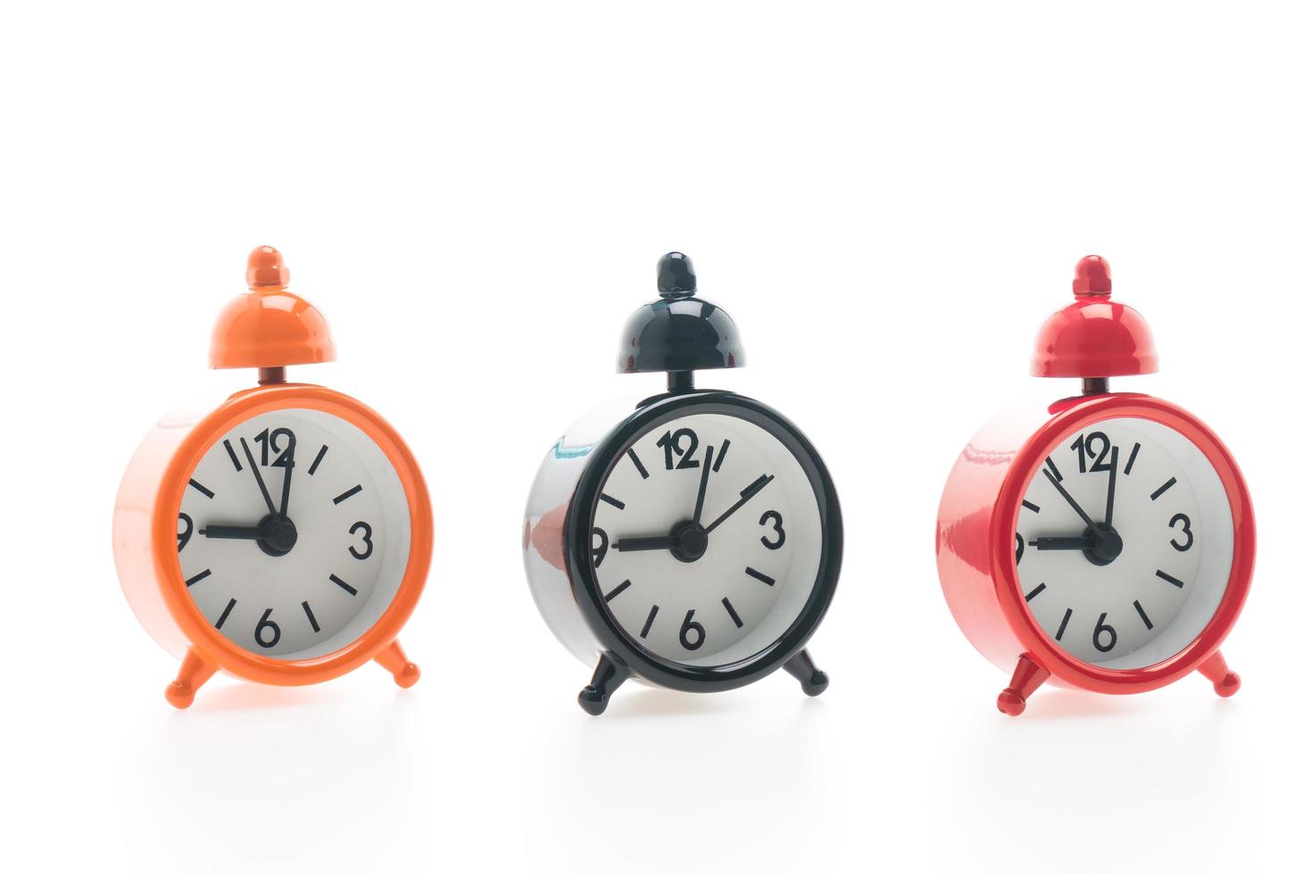 Alarm clocks on white background photo