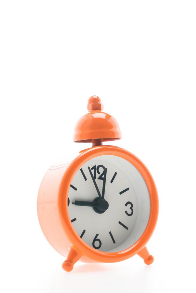 Alarm clock on white background photo