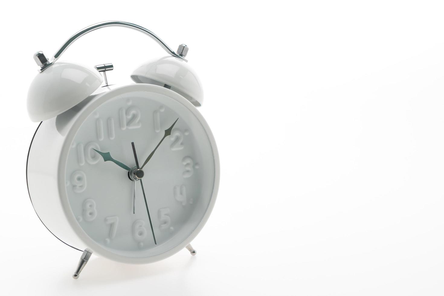 Alarm clock on on white background photo