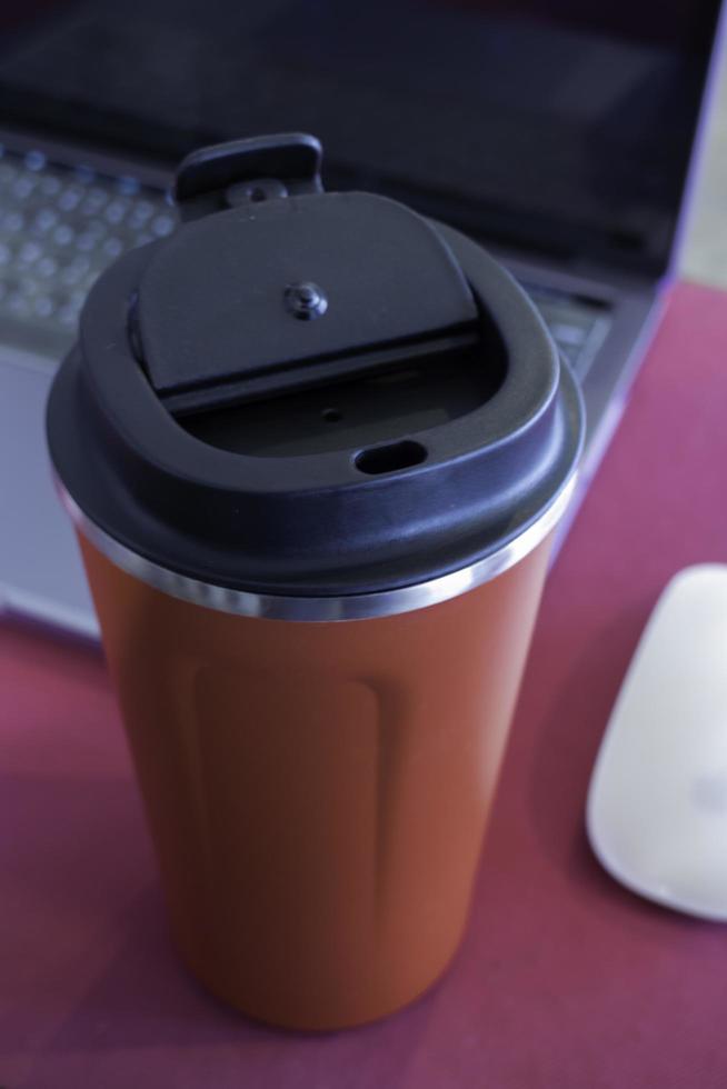 Brown travel mug photo