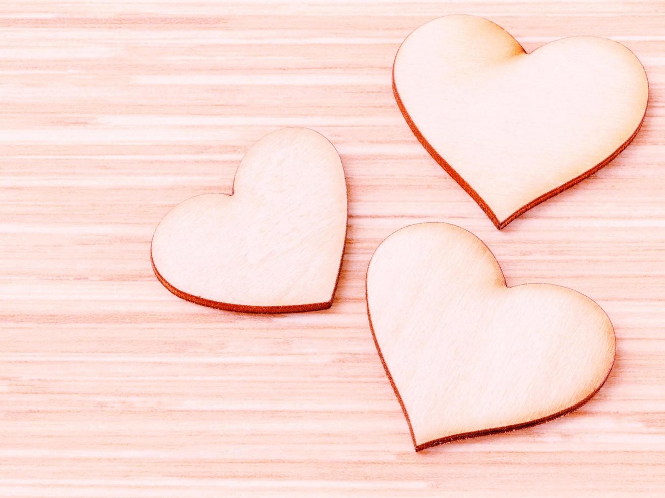 Three wooden hearts photo