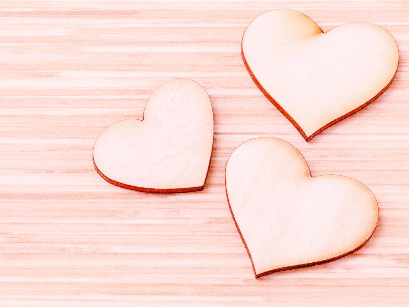 Three wooden hearts photo