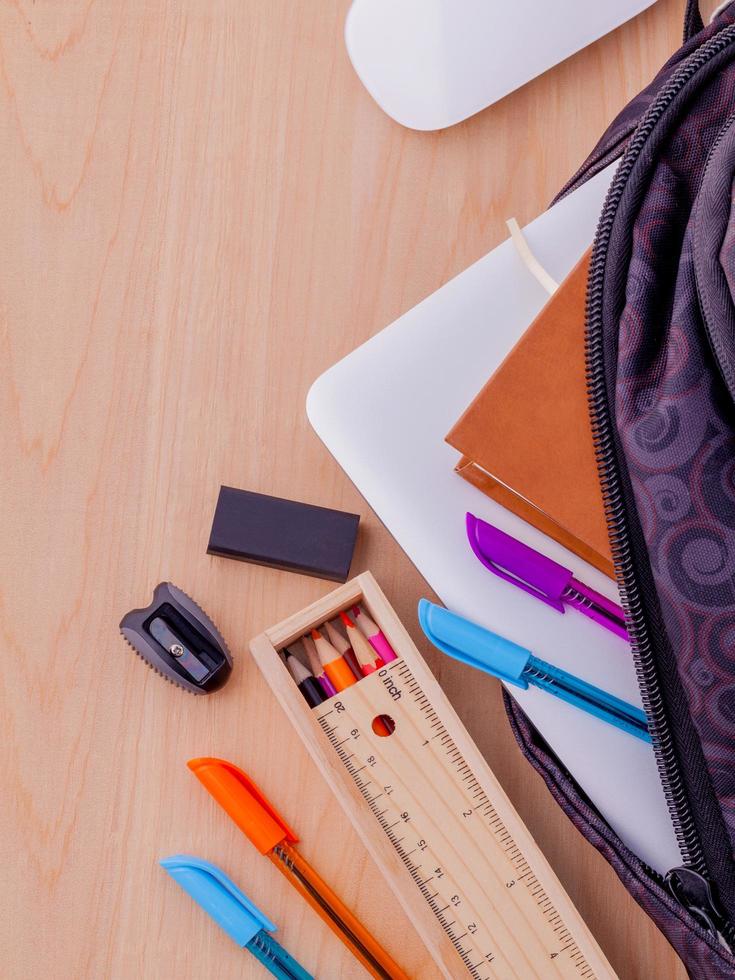 Backpack with school supplies photo