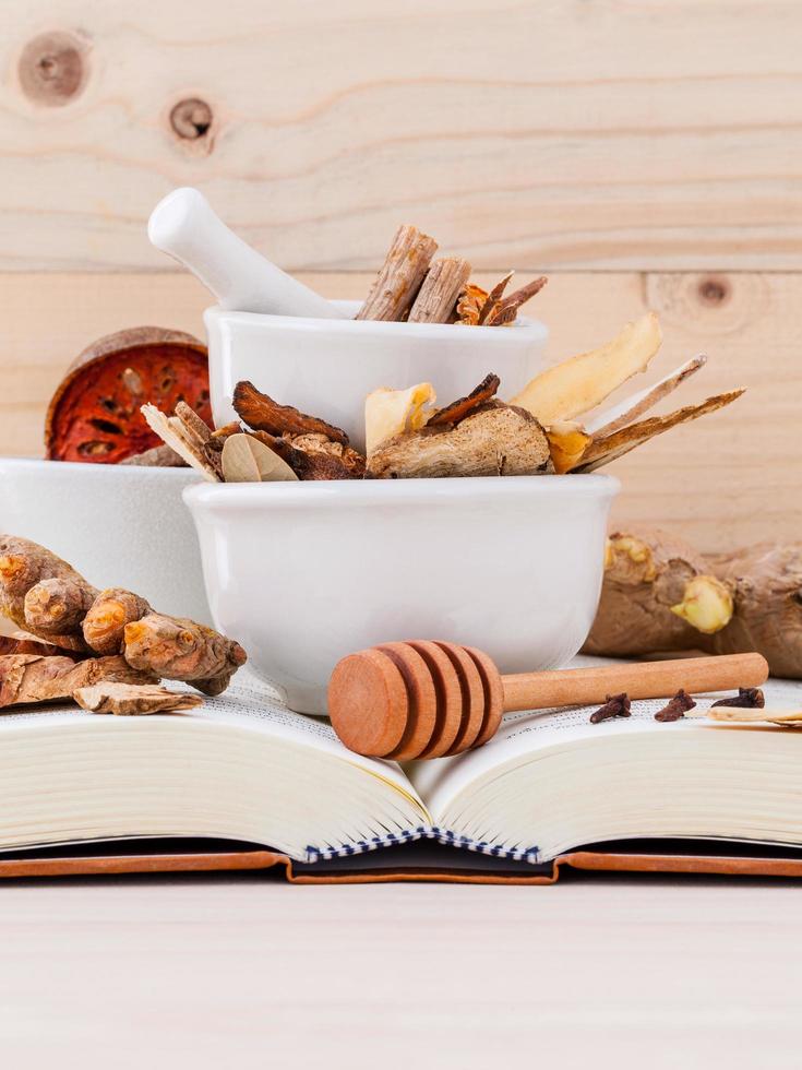 Chinese herbal medicine on a book photo