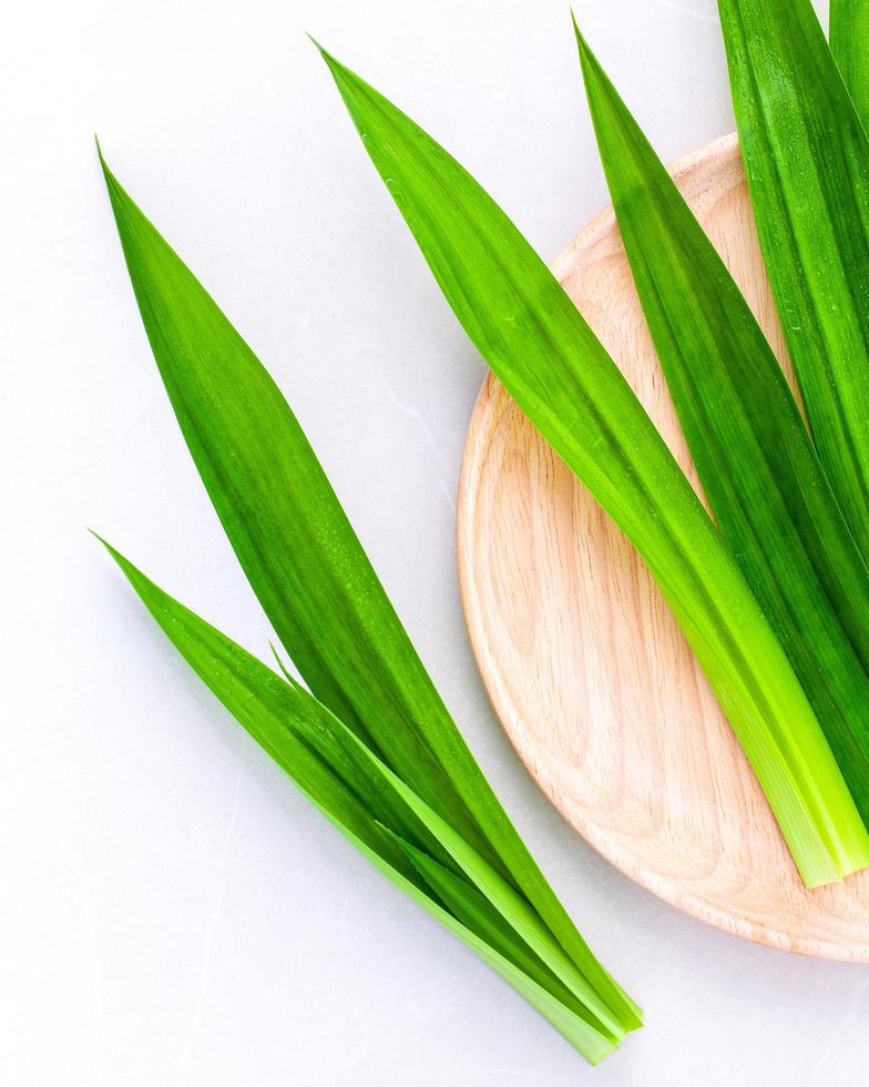 Pandan leaves on a wooden plate photo