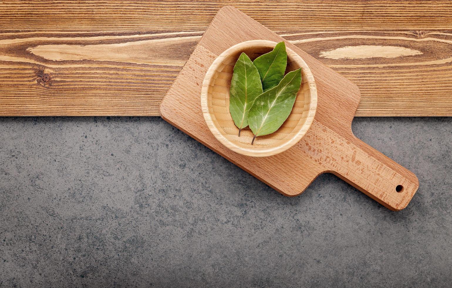 Bay leaves on a cutting board photo