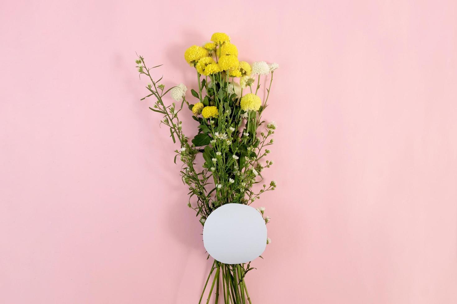 Bouquets of wild flowers with blank tag photo