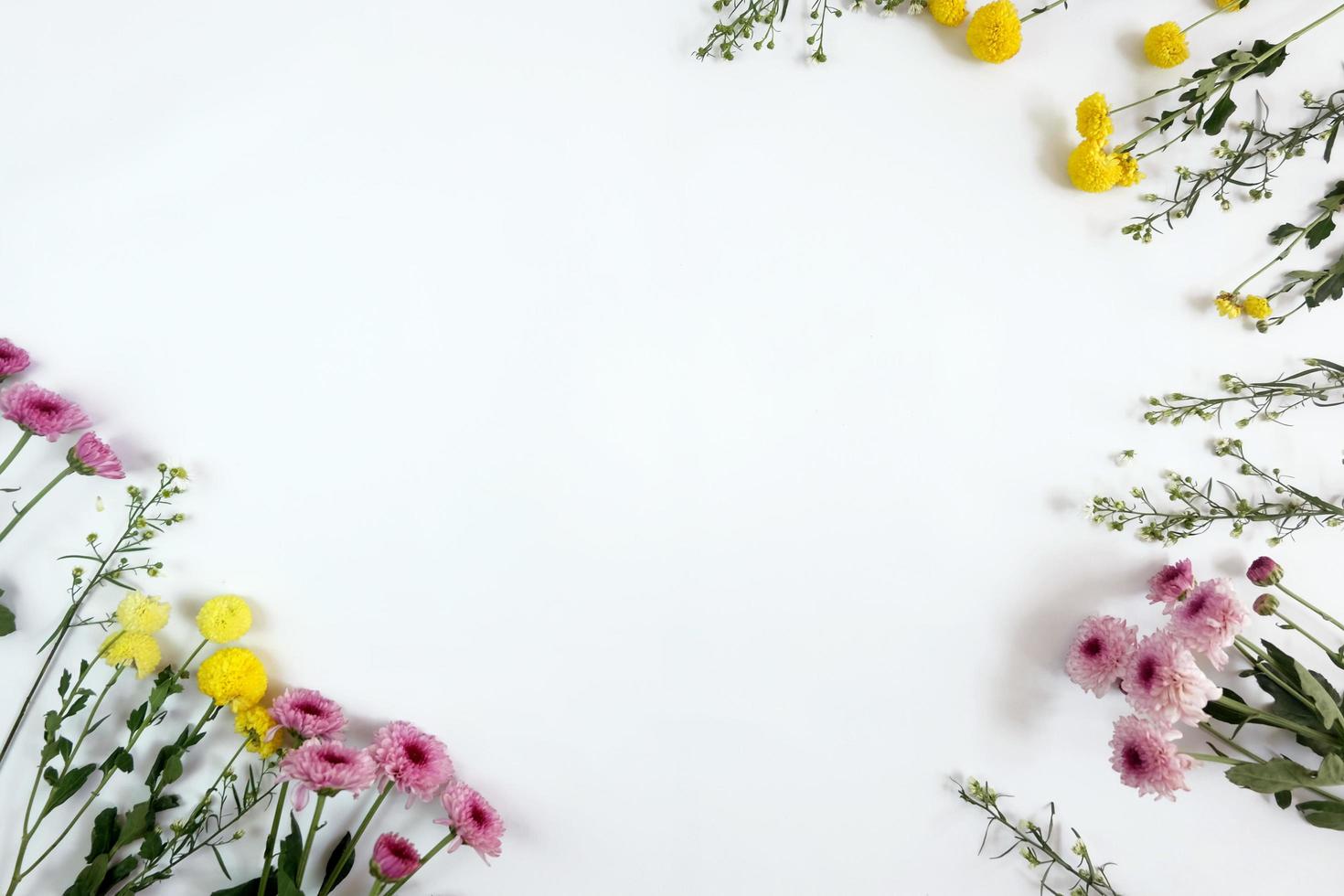 Floral arrangement frame on white background photo