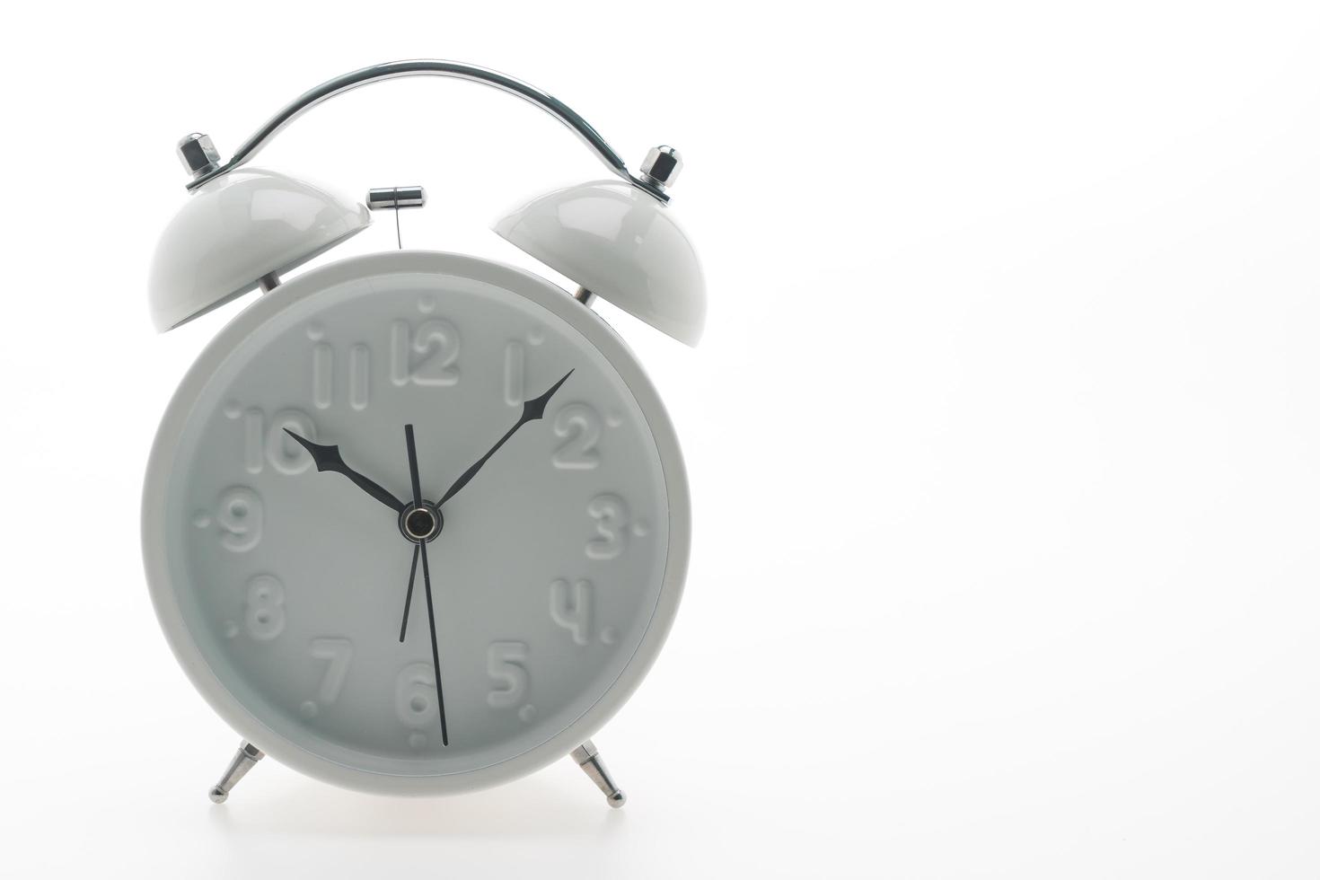 Classic Alarm clock on white background photo