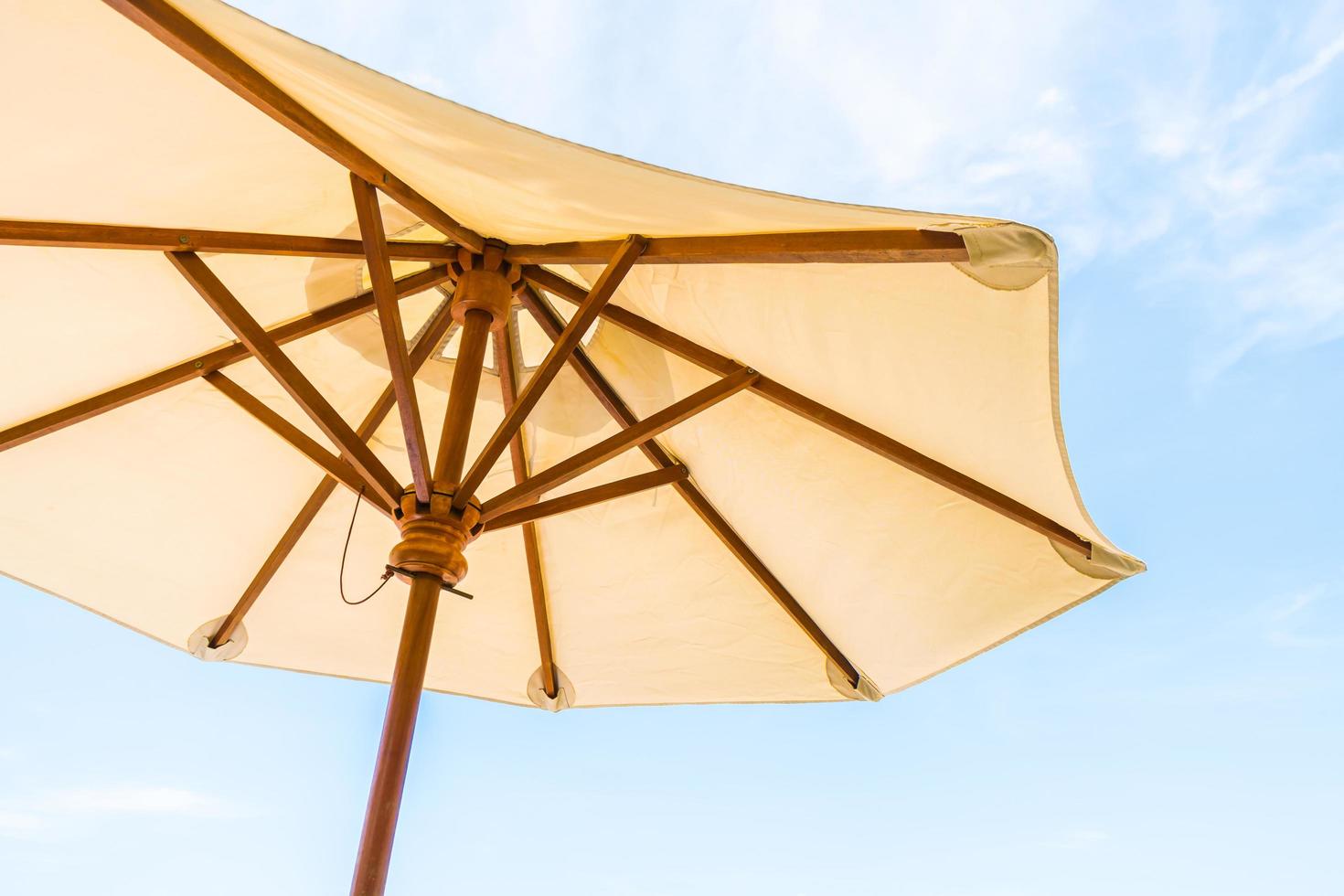 Umbrella and blue sky photo