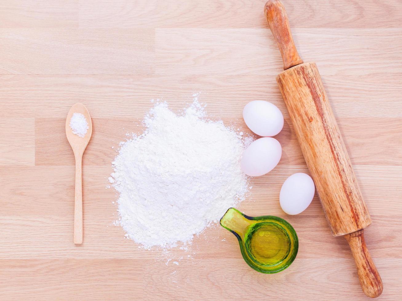 Pasta ingredients with rolling pin photo