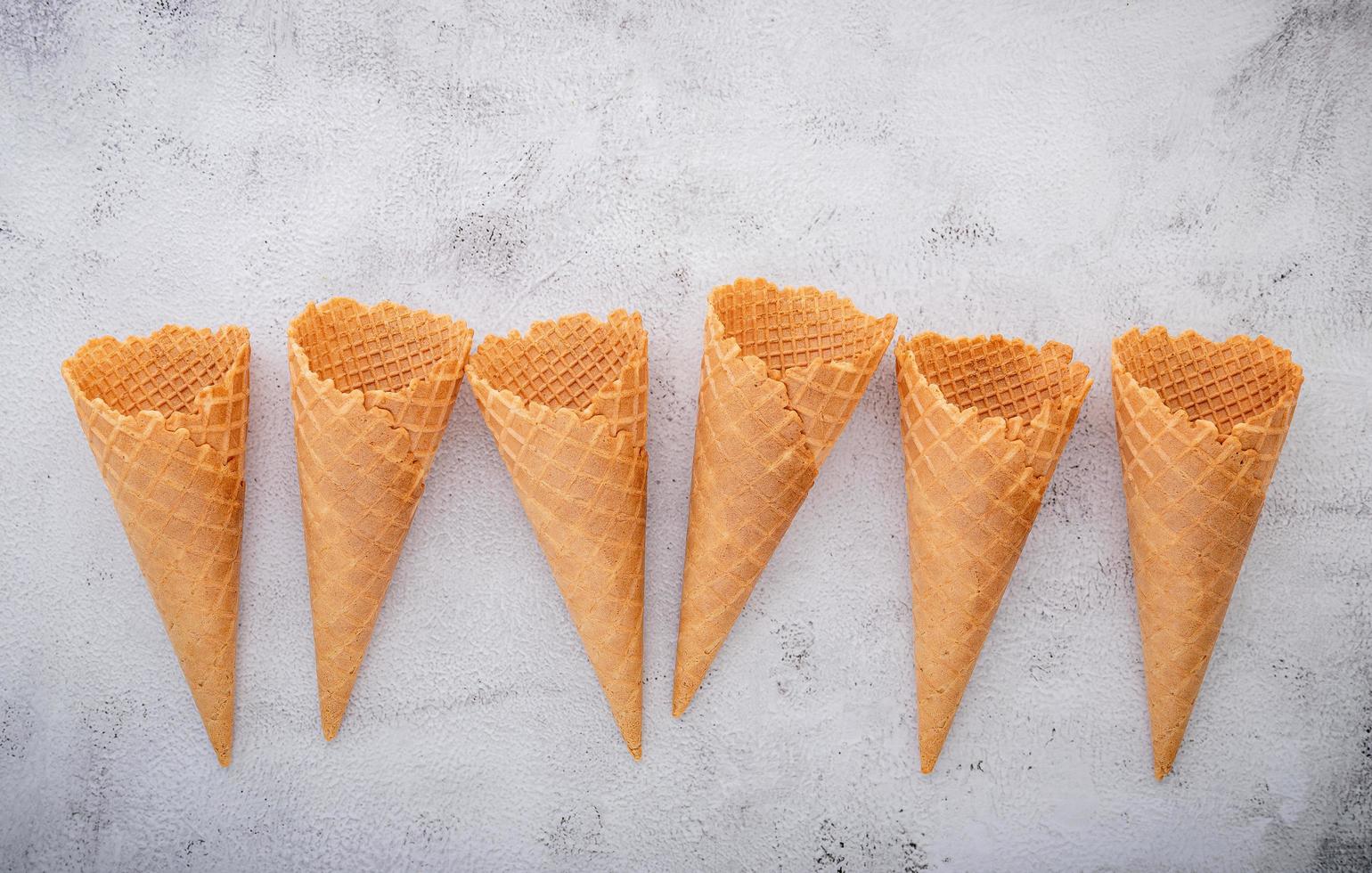 Ice cream cones on a light gray background photo