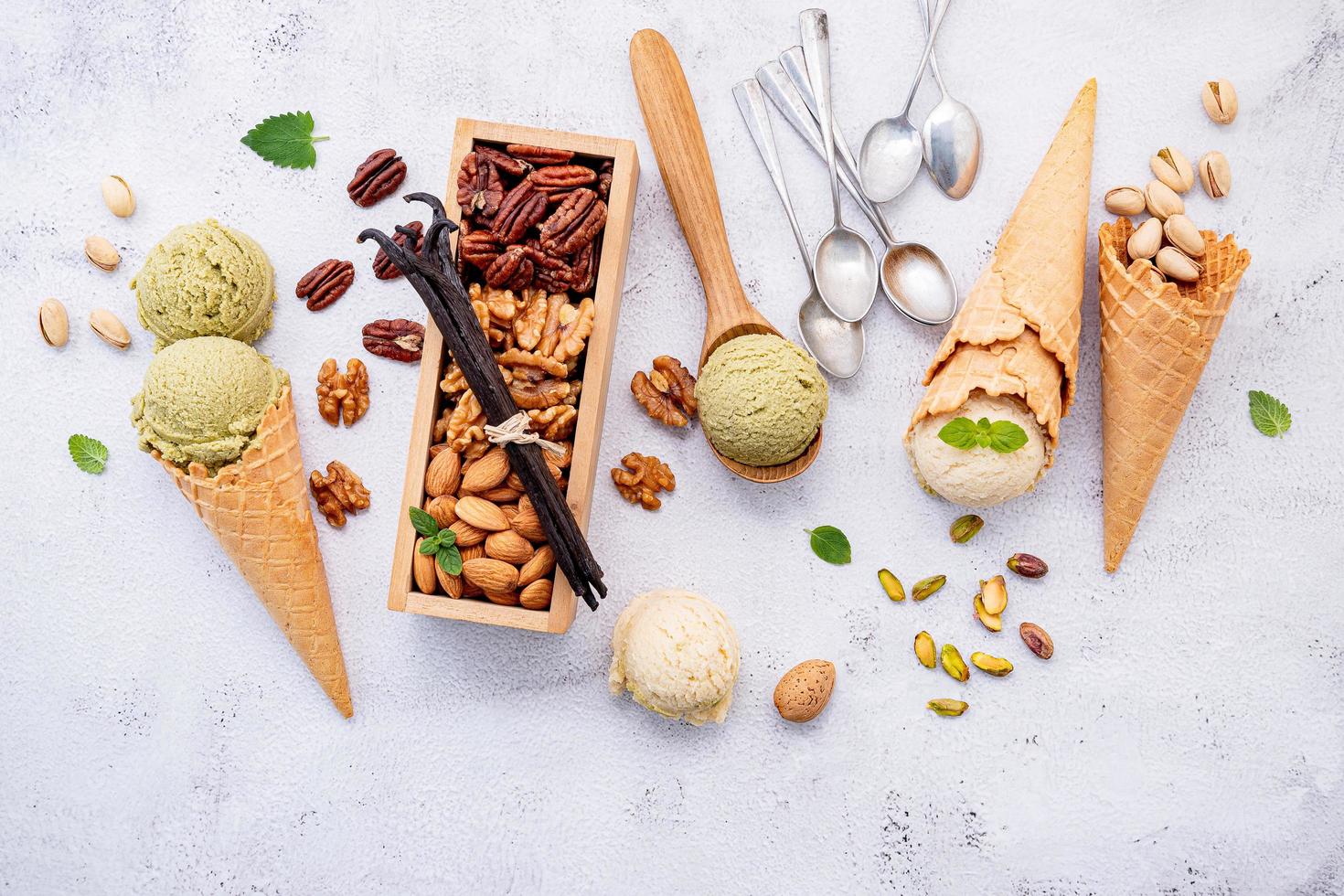 Pistachio and vanilla ice cream with nuts photo