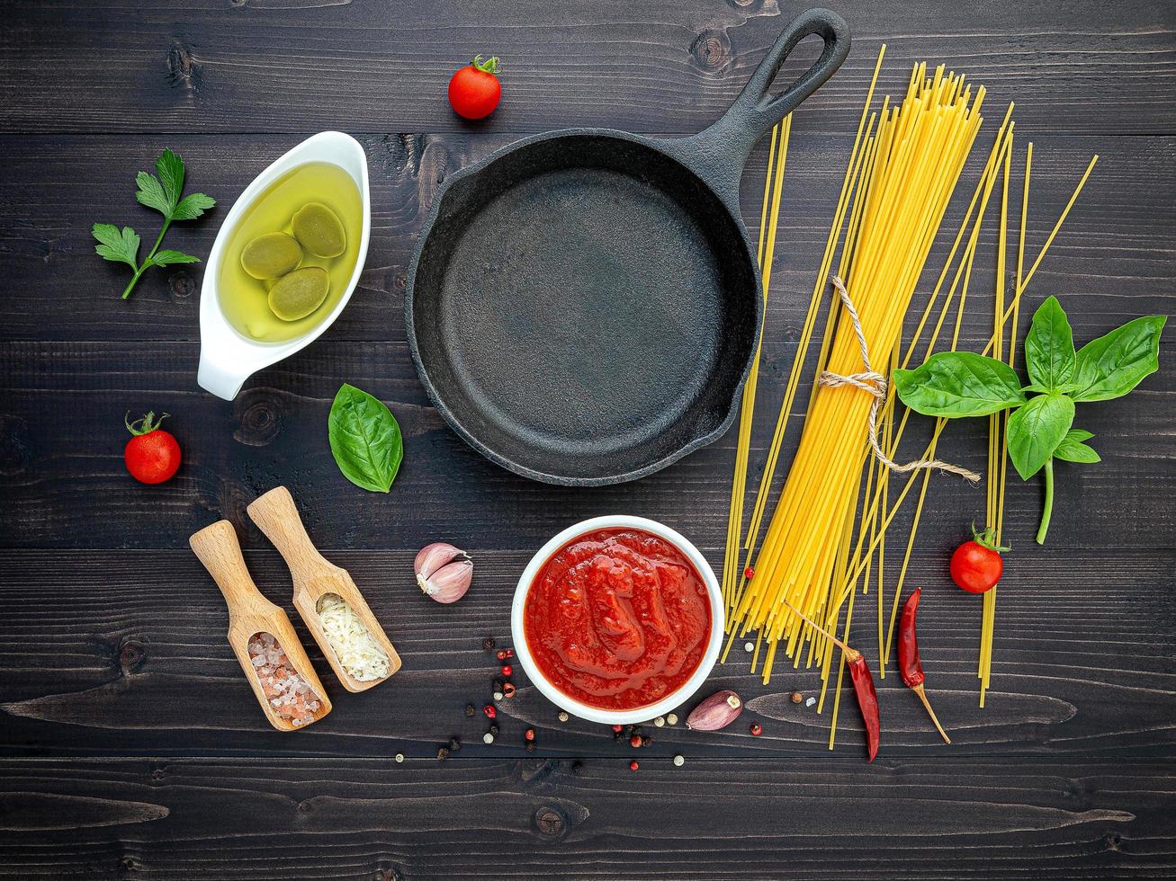 Spaghetti ingredients with a cast iron skillet 2032301 Stock Photo at