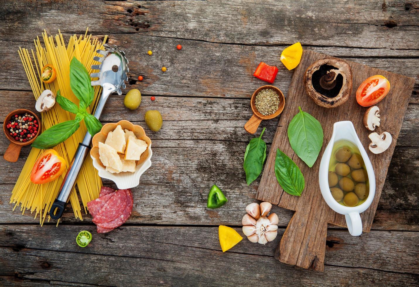 Fresh ingredients on rustic wood photo