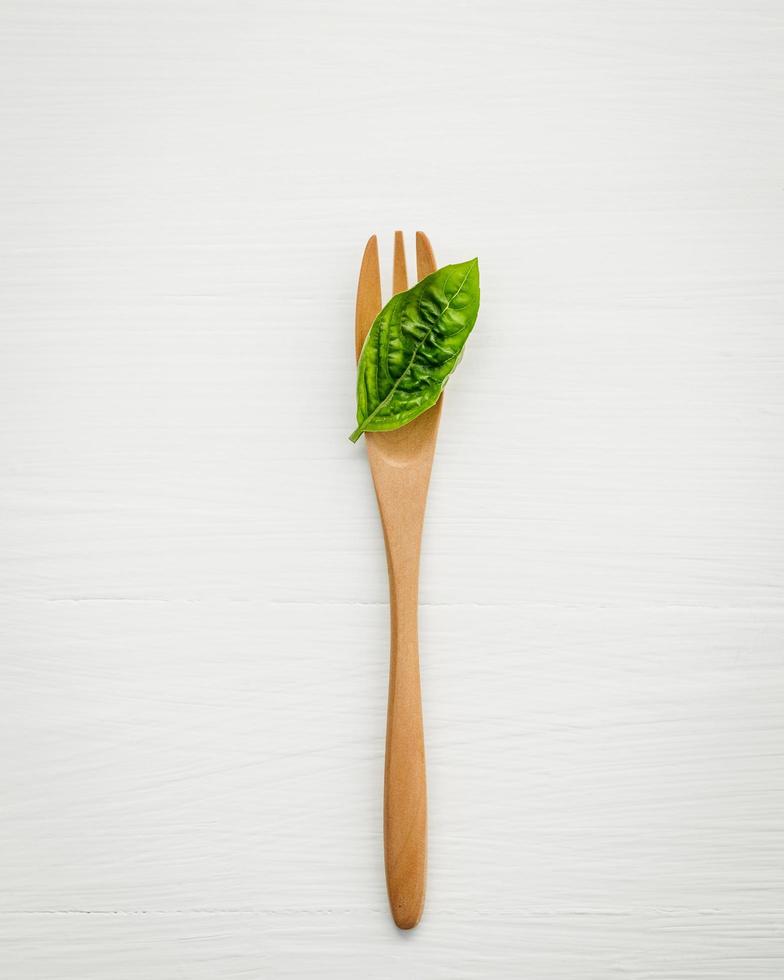 Sweet basil leaf on a fork photo