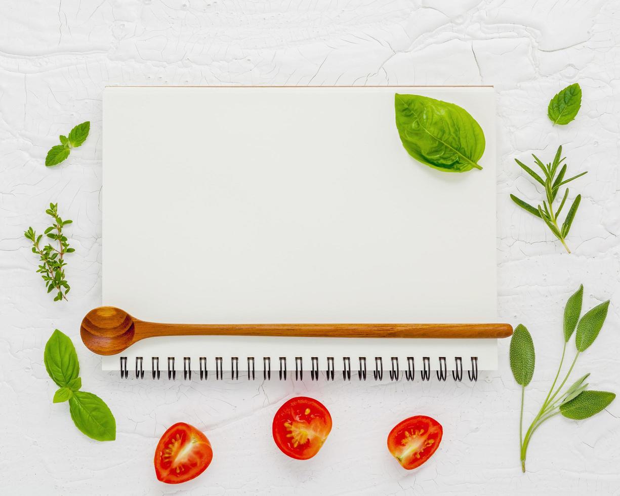 Blank spiral notebook with fresh ingredients photo