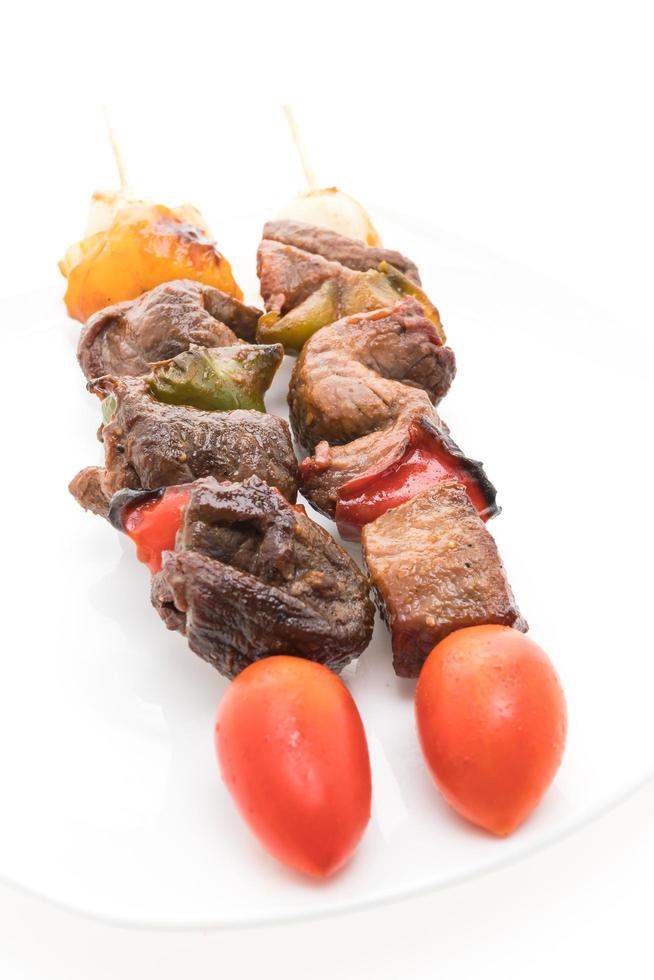 Grilled beef bbq stick on white background photo