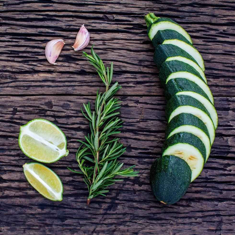 Lime, rosemary and cucumber slices photo
