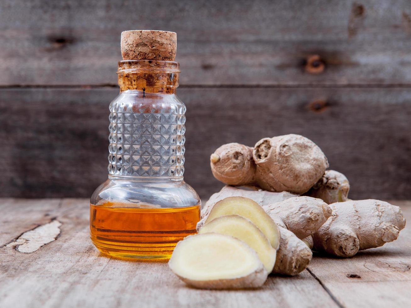 Ginger root and ginger essential oil photo