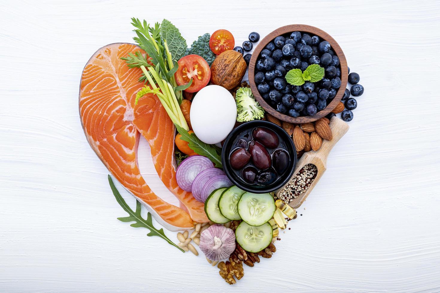 Health foods in a heart shape photo