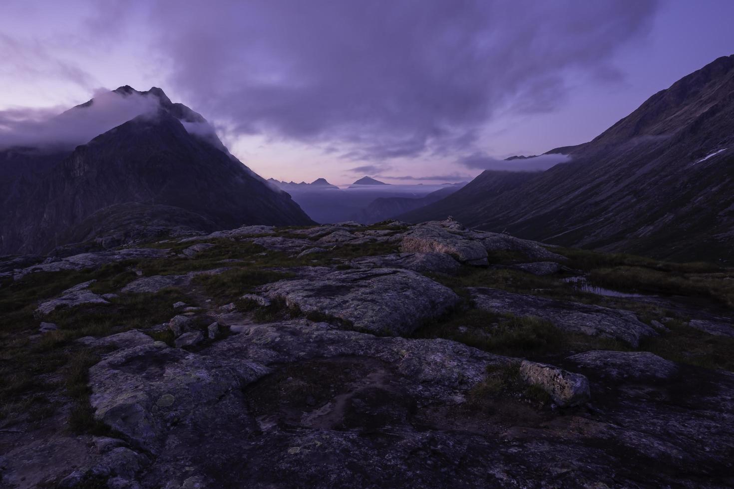 Mountain under gray skies photo