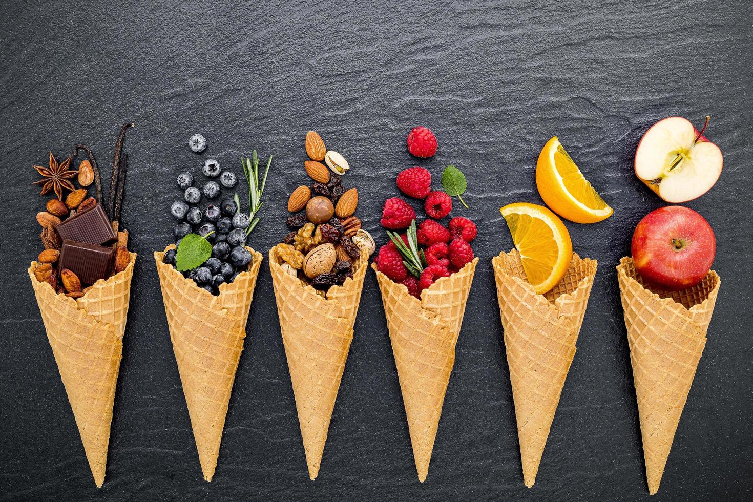 Fruits and nuts with ice cream cones photo