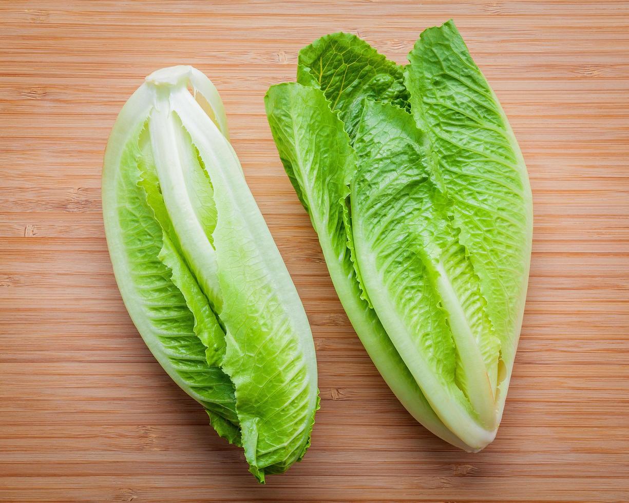 Fresh lettuce on wood photo