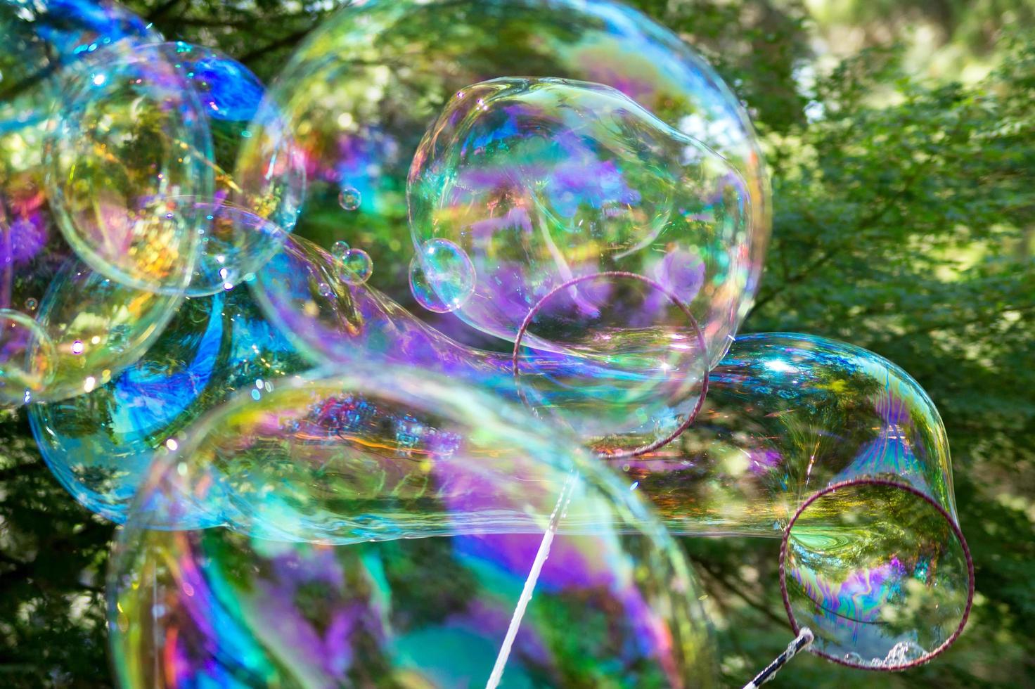 Huge soap bubbles outside photo