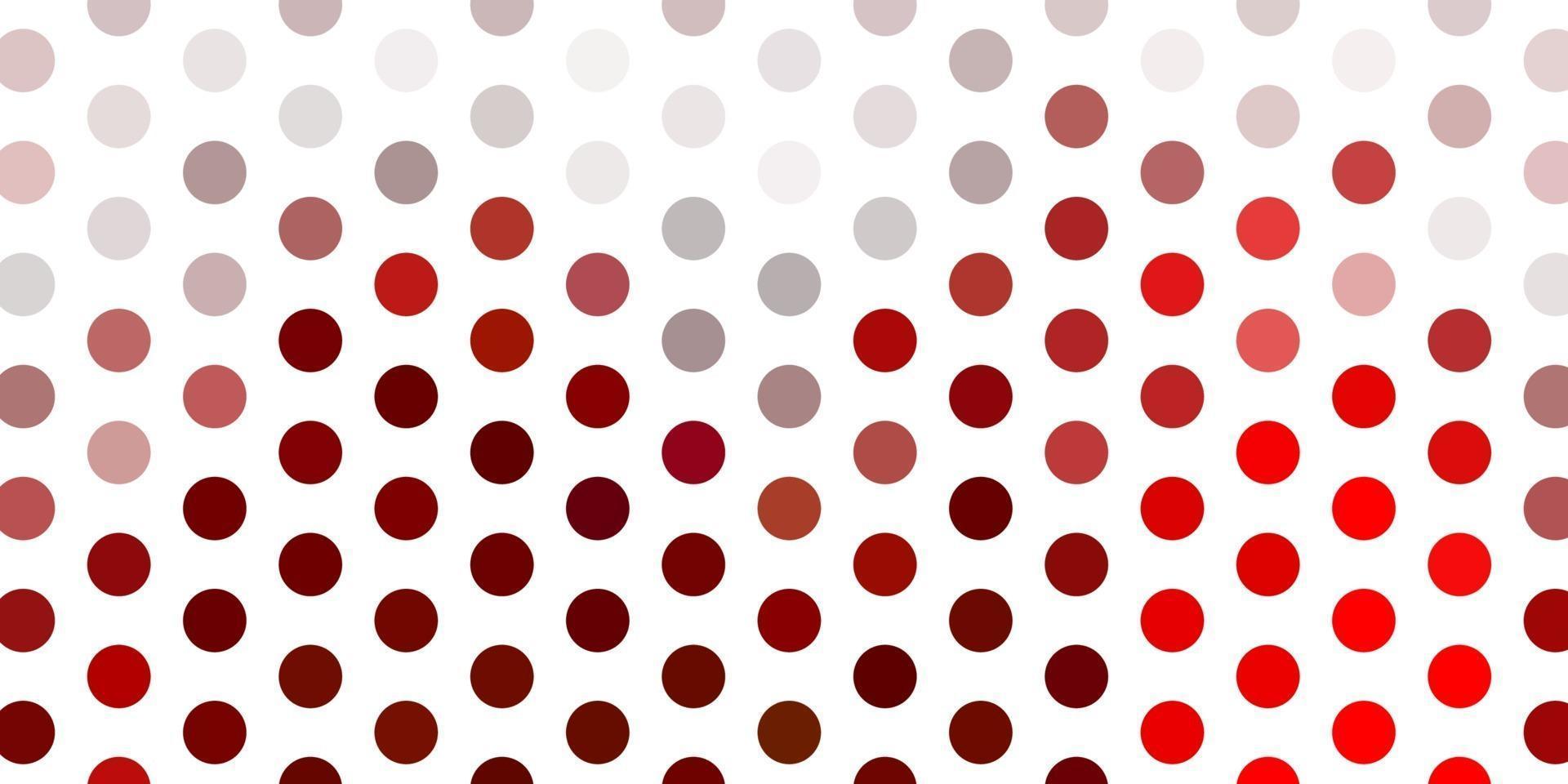 Light red vector pattern with spheres.