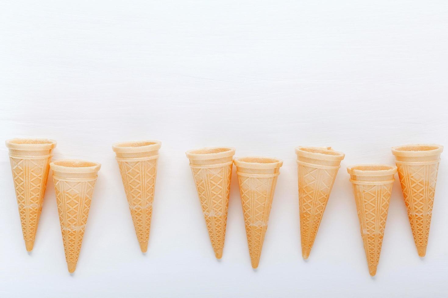 Waffle cones on white photo