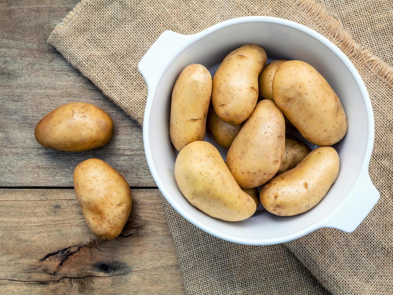 Fresh organic potatoes in a bowl photo