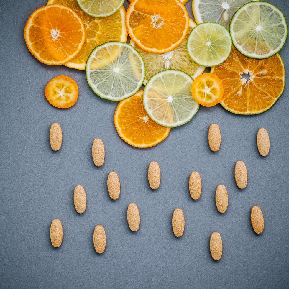 Sliced citrus fruit and almonds photo