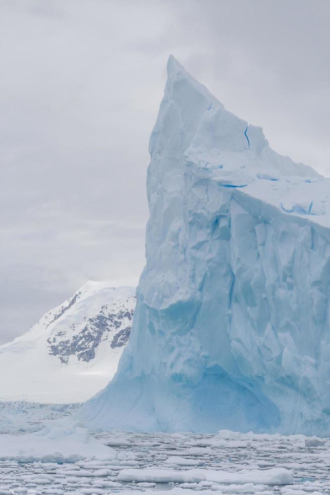 Pinnacle shaped iceberg in Antarctica photo