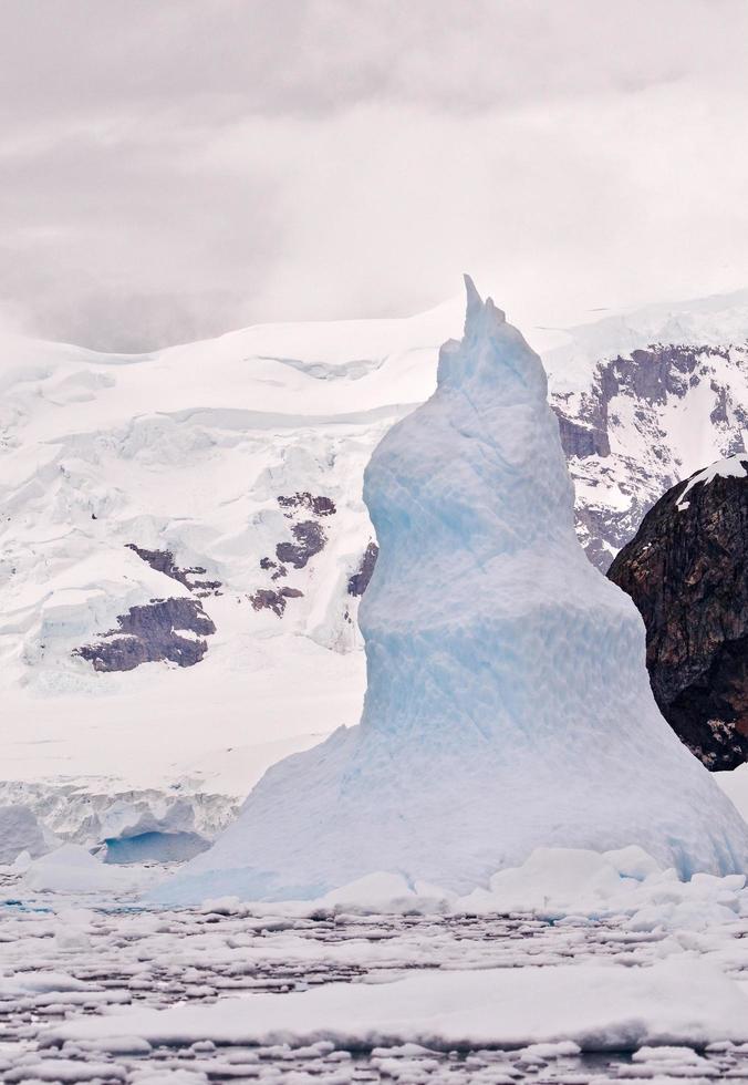 Pinnacle shaped iceberg in Antarctica photo