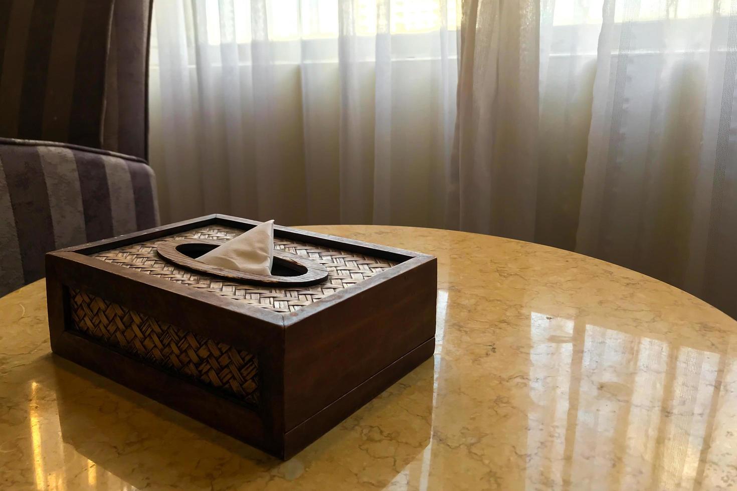 Tissue box cover on a table photo