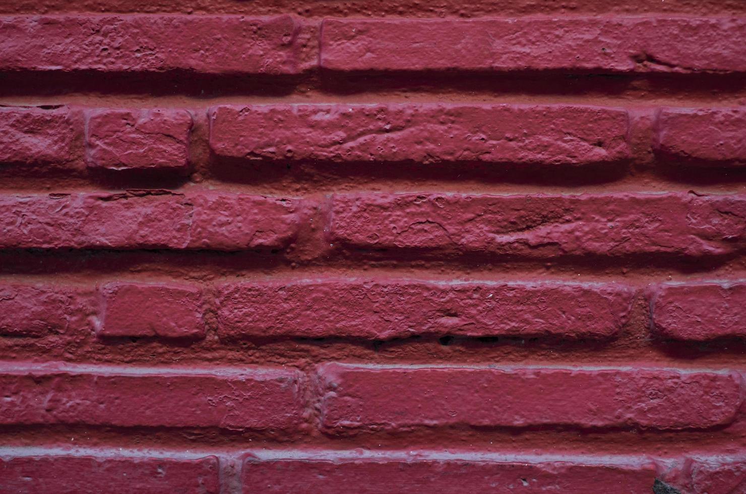 Fondo y textura de la pared de ladrillo rojo foto